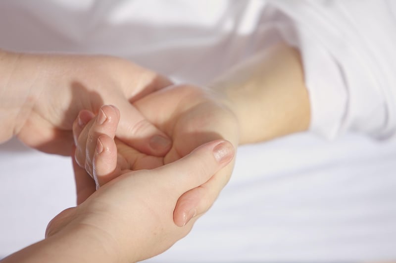 Diverse hands holding together